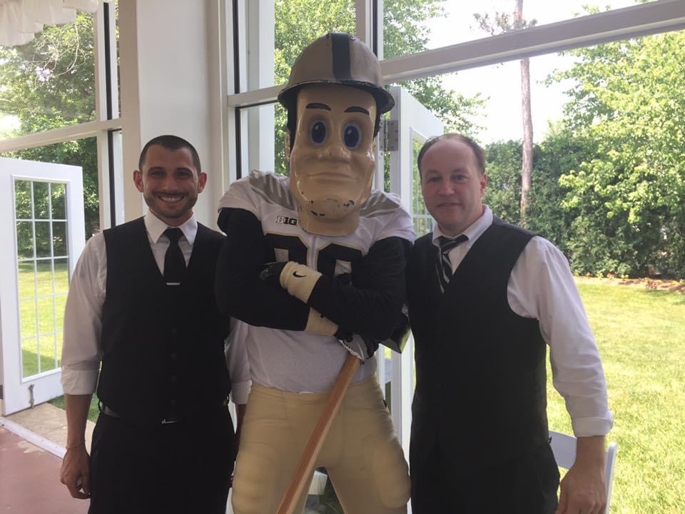 Velocity Sound team with Purdue mascot at event